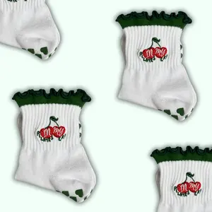 Dark green ruffle cherry "in my Pilates era" grip socks