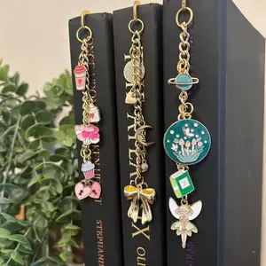 Charm Hook Bookmarks with Assorted Charms Including Cupcake, Moon, and Fairy Designs