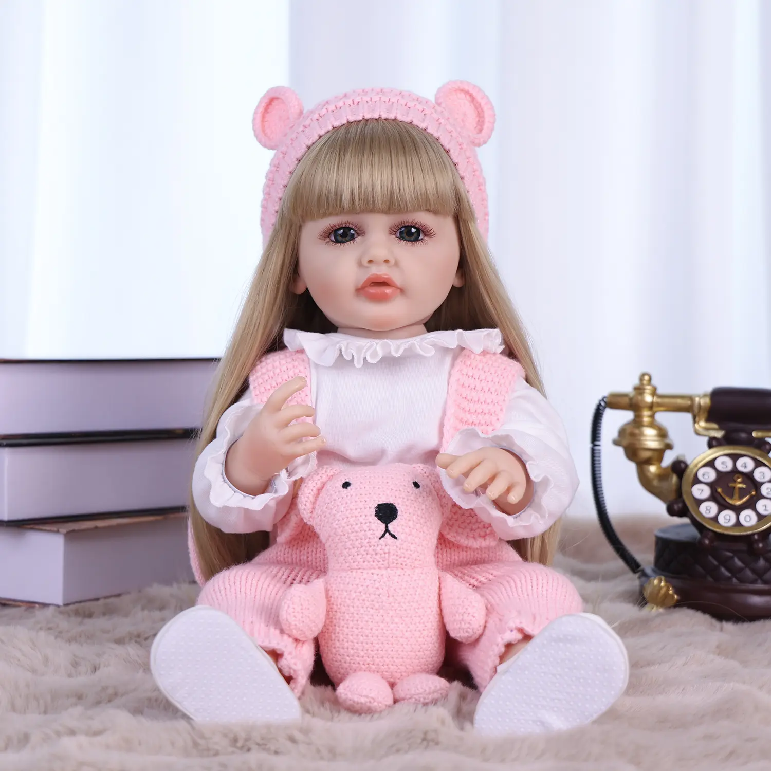 KEIUMI Reborn Baby Doll - 22 in Cute Collectibles Toy, Long Golden Hair, Charming Starry Eyes, Safe Material, Birthday/Christmas Gift for Girls