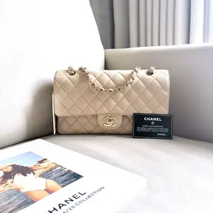 Pre-owned CHANEL Medium Classic Flap Bag in Quilted Caviar Leather, Beige with Gold Hardware Circa 2010 2011 14027266 A127 HK