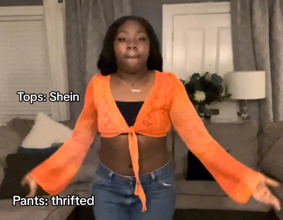 Orange flowy mesh lose top with flare arms