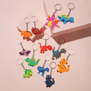 12Pcs PVC Dinosaur Keychains Dinosaur Bracelet Pendant Key Chain Dinosaur Birthday Party Gifts Bag Fillers Supplies