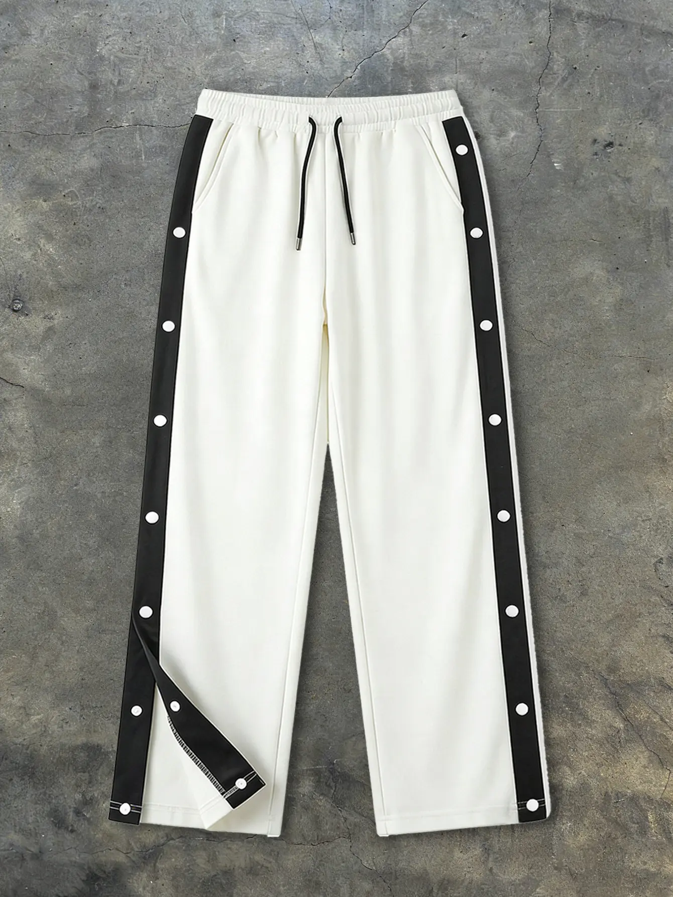 Unisex black & white colorblock wide leg sweatpants – side snap closure, elastic waistband with drawstring, soft knit fabric, relaxed straight fit, American high street basketball style for campus, commuting, and streetwear