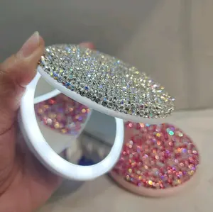 ESPEJO CON PEDRERIA DE DIAMANTES EN IMITACION PERFECTA