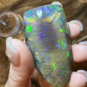 Ethiopian cabbed Water Opal Specimen with lavender confetti play of color