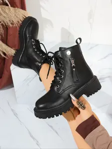 Elegant and comfortable women's riding boots suitable for outdoor wear. These stylish short boots match street fashion trends, making them perfect for casual outings and daily commutes. They feature practical design combined with unique elements.