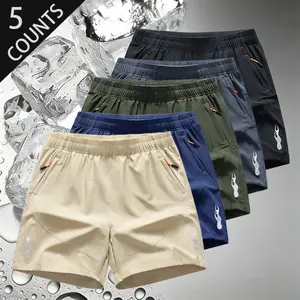 Men’s solid-color shorts with zippered pockets, regular fit, casual drawstring waist; suitable for everyday outdoor wear and all seasons; breathable polyester athletic shorts.