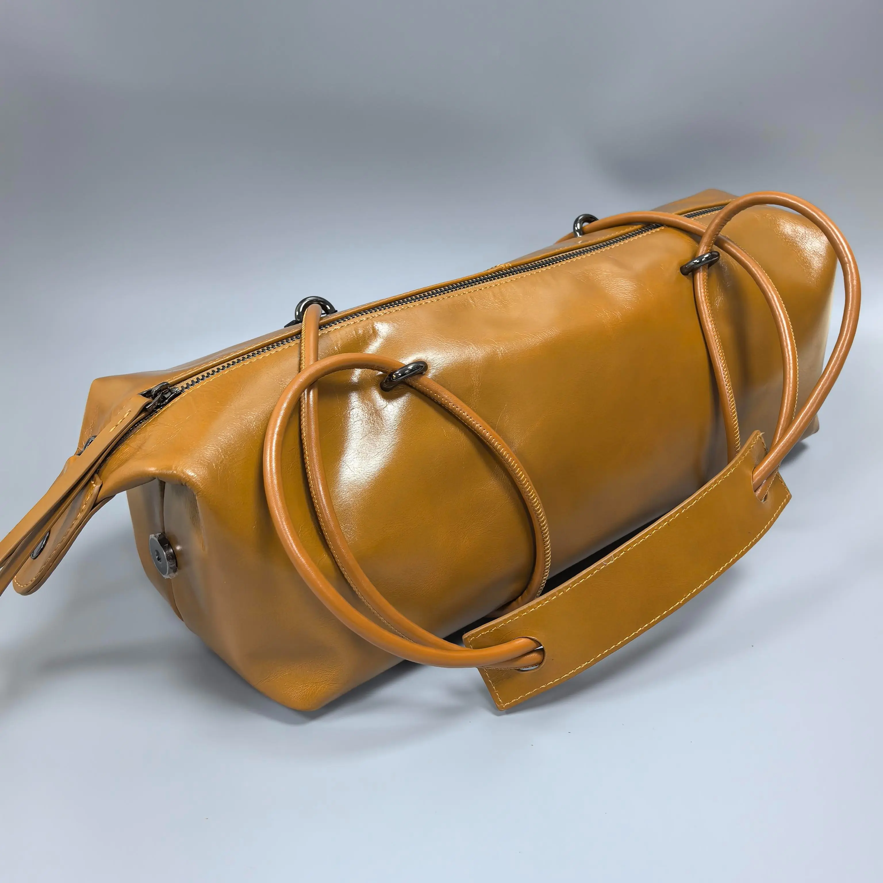 [Summer Picks] Kystra Handcrafted Oil Wax Leather Dumpling Purse - Ultra-Light, Paper-Soft Patina Leather, Water-Resistant Top-Handle Bag with Polished Gunmetal Hardware