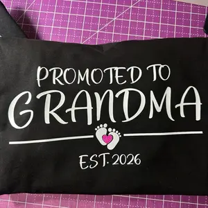 Promoted to Grandma Vneck Tee Bella Relaxed Fit Super Soft Bling Blue Baby Feet EST 2026