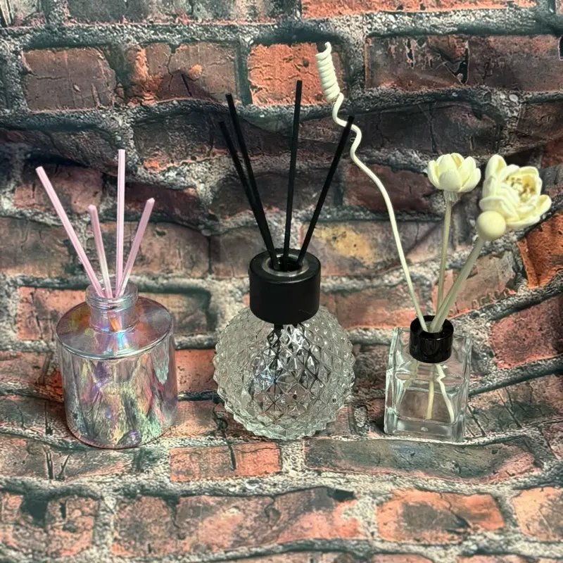 Air diffusers with reeds