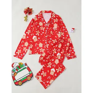 Christmas-themed gingerbread man print pajama set: long-sleeve lapel top + pants. Soft, comfortable loungewear with full festive vibe. All-over print for eye-catching appeal, combining comfort and style. Women's pajamas & loungewear. Nightwear Womenswear