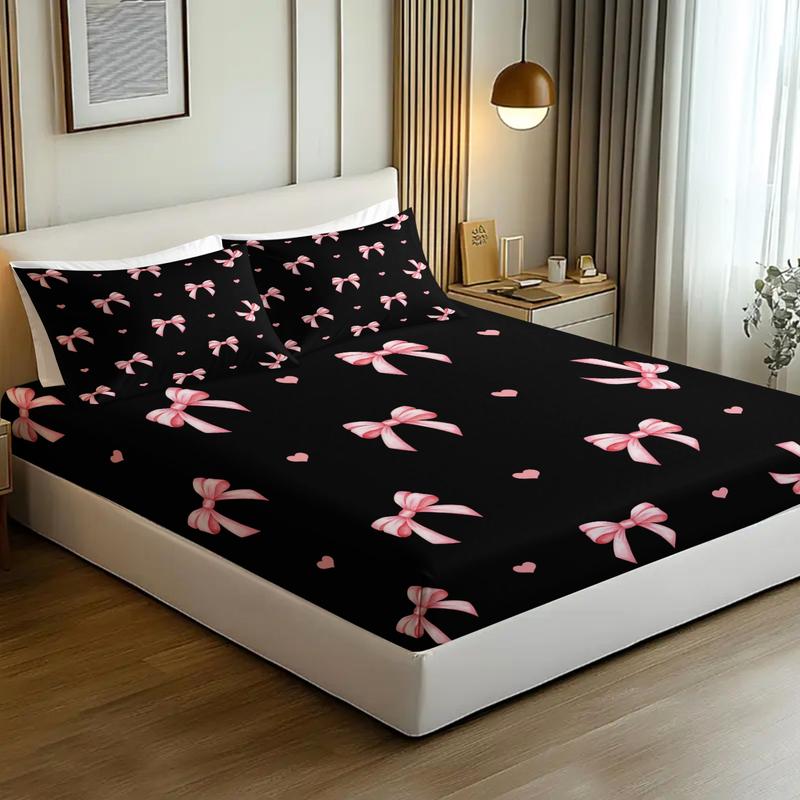 3-piece Bedding Set Features A Black Background With Pink Bow And Heart Prints, Including A Fitted Sheet And Two Unfilled Pillowcases. The Design Blends Two Elements, Creating A Romantic And Sweet Yet Cool Bedroom Décor, Gift Choice, Bed Sheet Sets