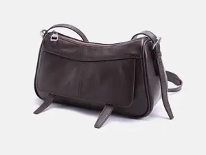 Elegant women’s genuine cowhide leather camera bag — versatile for commuting, can be worn on one shoulder or crossbody