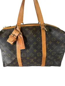 Pre-owned Louis Vuitton Coated Canvas Travel Bag Monogram Sac Souple 35 cm