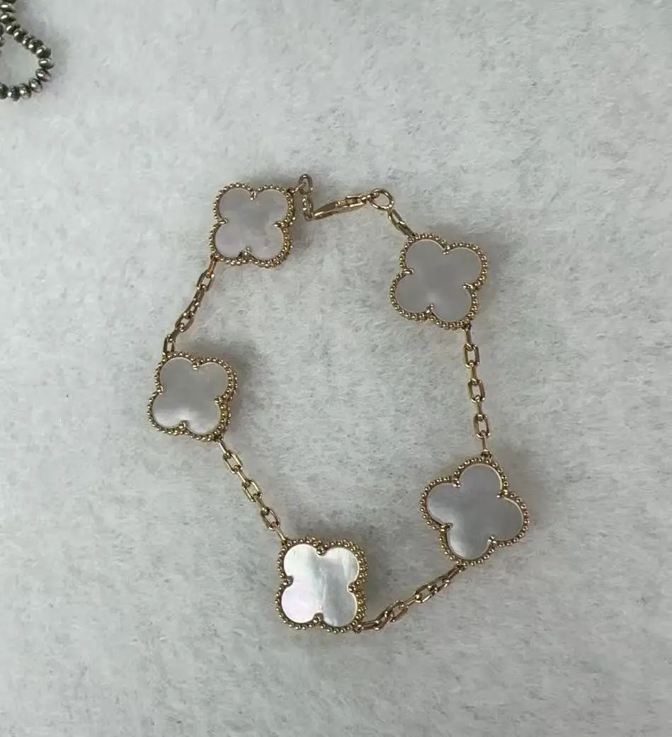 Pre-owned H1 Van Cleef & Arpels 5 petal white mother of pearl bracelet BE 0718009