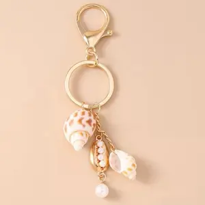 Sea Shell & Pearl Bag Charm Key Chain with Gold Tone Lobster Clasp and Natural Shell Accents
