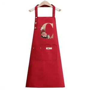 Red Polyester Apron, Gold Floral Letter "M" - Adjustable Straps, Large Pockets, Suitable for Cooking, Gardening, Painting, Baking - Perfect for Holidays, Christmas, Halloween, Holiday Apron| Floral Embroidery| Adjustable Strap Apron