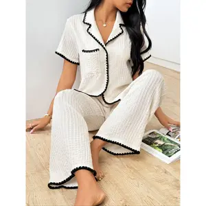 Women’s pajama set featuring a contrast-bound lapel-neck short-sleeve top with front buttons and pockets, paired with wide-leg pants; casual, comfortable sleepwear for women; National Day offers; pajama set.