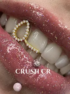 CRUSH CR 1pc 14K Gold Plated Teardrop Grillz with Cubic Zirconia, Hollow Heart Design, Statement Hip-Hop Tooth Jewelry, Tooth Gems for Black Women, Girls, Men. Bold Style. Perfect for Parties, Halloween, Cosplay Gifts