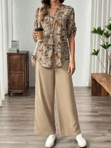 Women's floral flower print V-neck chest fake button fitted long-sleeved top and wide-leg trousers version solid color trousers two-piece set