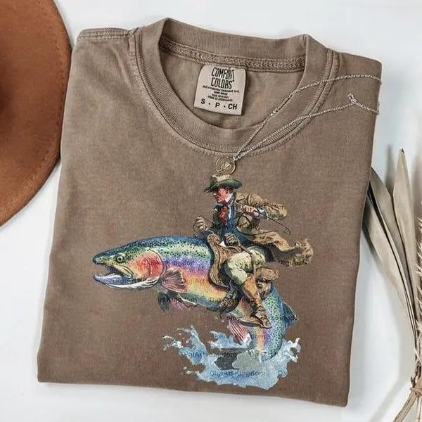 Comfort Colors Vintage Cowboy Riding Trout T-Shirt, Western Fishing Retro Tee, Funny Cowboy Fish Shirt, Unique Outdoors Gift for Him, Angler Country Style Graphic Tee