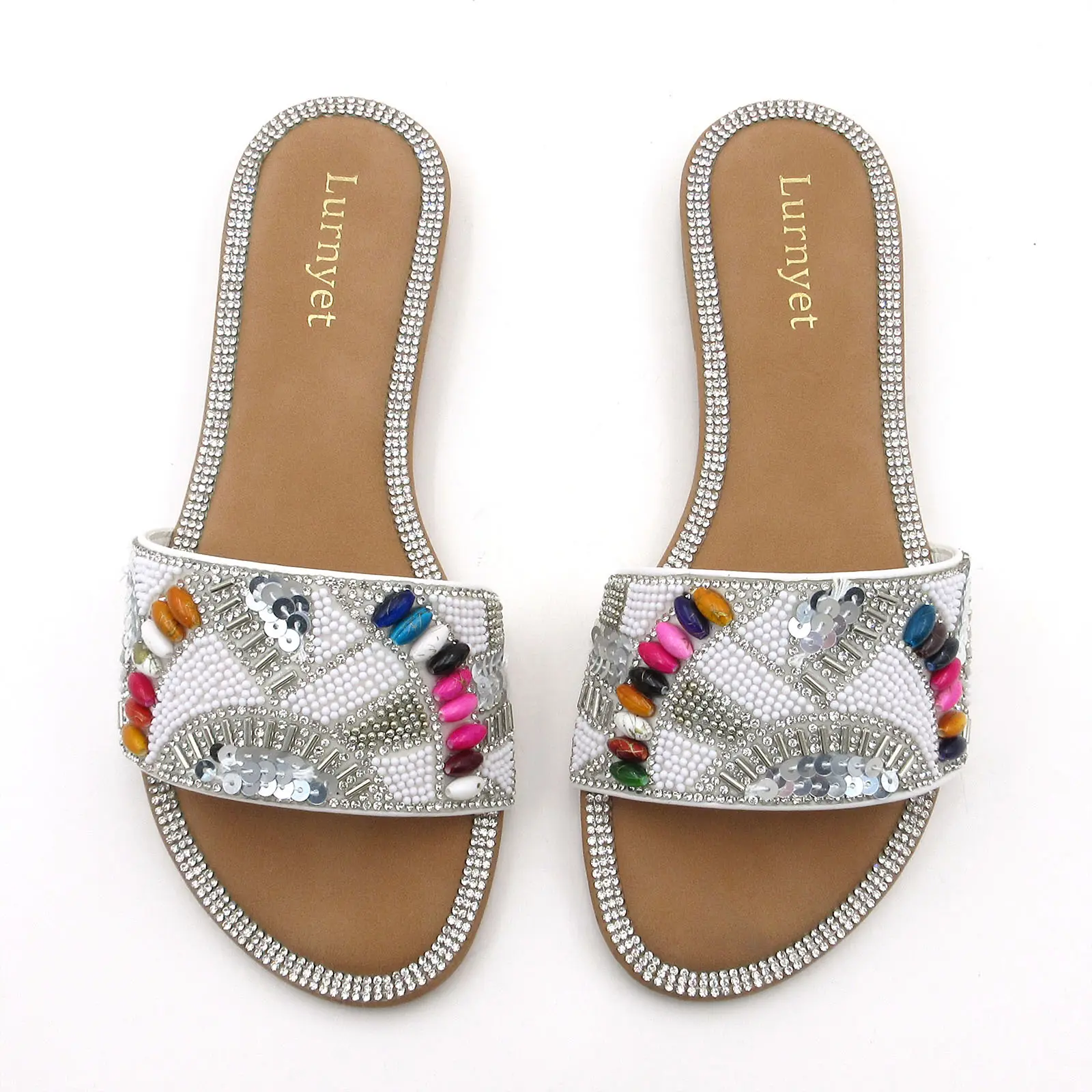 Sparkling, dazzling women’s fashion slides — flat sandals filled with glitter, soft and comfortable for summer beachwear, travel, and everyday wear