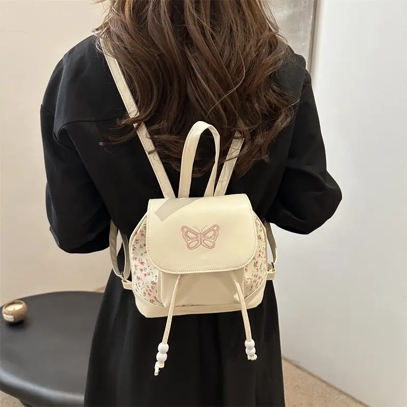 Cream Butterfly Print Mini Backpack - Stylish Women\'s Bag Emma Backpack Ivory Butterflies | SEVDA LONDON main image 3