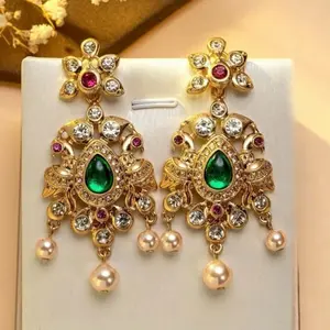 Golden traditional women long earrings with green stone stud and tear drop tassels