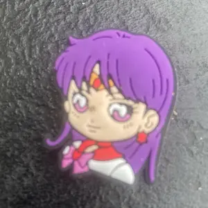 Anime Purple Croc Charm Jiblet with Purple Hair and Red Bow