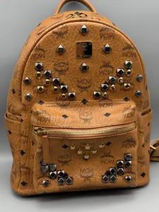 Pre-owned MCM Canvas & Leather Backpacks Visetos Studded Backpack Cognac | Mini Stark Backpack Leather Trim