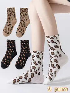 3 pairs of women's mid-calf leopard print socks, breathable, sweat-absorbent, comfortable, fitted, trendy animal pattern, fashionable and versatile. Suitable for daily casual wear, sports, running, and various other occasions.