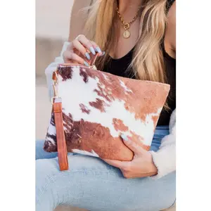 Aili's Corner Faux Fur Cow Animal Print Clutch