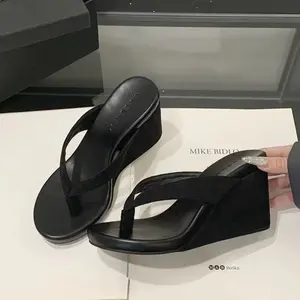 Casual high-heel flip sandals with an 8 cm thick platform wedge heel design—versatile summer travel item available in multiple colors.