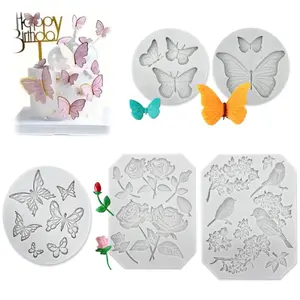 A set of 5 Silicone Bird and Blossom Branch Fondant Mold - Magpie Bird Shape Cupcake Topper, Cake Decoration, Chocolate Candy, and Clay Molding Tool - Home Improvement. Reusable