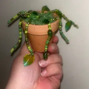 Green Beaded Plant Decor Handcrafted Elegance with Unique Leaves and Stems for Versatile Home Decor Nature Inspired Hanging Art