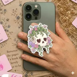 Floral Skull Phone Grip Clear Acrylic Griptok - Aesthetic Pastel Goth Flower Skeleton Cell Phone Stand Holder, Cute Spooky Heart Eye Kindle Ereader Ring Accessory, Whimsical Gift for Bookworms and E-Girls