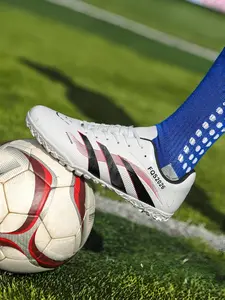 Unisex Black-Red-White Contrast Accent Soccer Shoes: Bold Identity Style, Contrast Stripes, Firm Ground Structure, Textured Upper, Football Field Boots. Ideal for match visibility/trendy gameplay