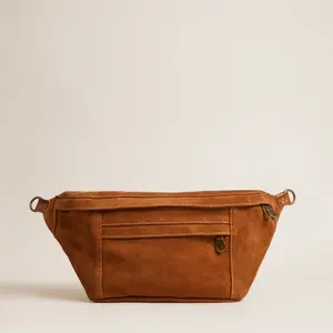 Cross Your Heart Sling - Suede Caramel 100% Soft Supple Material with 2 Zipper Pockets 18.5"W x 7"H x 3"D Hands-Free Carry Bag