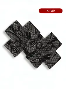 A pair of  black cross shape lace nipple covers,  with a seamless patch design, providing comfortable and reusable protection for nipples, gentle on the skin.  specially designed for matching strapless dresses and halter neck skirts to prevent bumps.