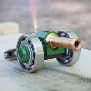 Stainless Steel Mini Cannon That Shoots Firecrackers, Red Desktop Artillery with Bearing Wheel Design, Mechanical Collectible for STEM Enthusiasts #RBH