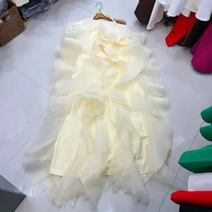 Elegant Yellow Ruffled Dress with Flowing Layers and Soft Fabric for Special Occasions