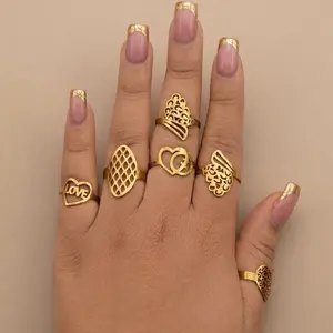 6 piece Elegant Gold Color Rings Set with Heart, Waffle, and Floral Designs for Women's Fashion Accessories