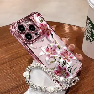 Phone case with pink lily design, compatible with iPhone 11/12/13/14/15/16/17 Pro Max, 14/15/16 Plus, X, & XS Max models, featuring a built-in chrome pink frame and drop protection.