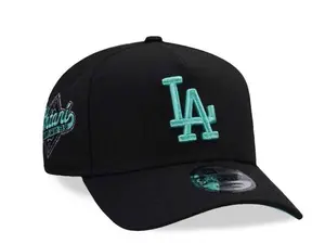 Los Angeles Dodgers New Era 9FORTY Snapback Baseball Cap – Dark Green Flat Brim Hat with White LA Logo & Anniversary Side Patch, MLB Streetwear Headwear