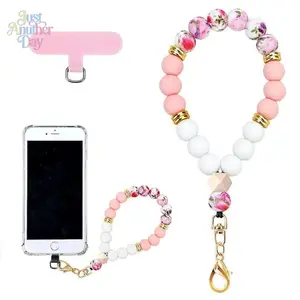 Floral Beaded Phone Wrist Strap Pink and White Silicone Beads with Gold Accents and Floral Print Beads Anti Drop Phone Bracelet Chain for Most Smartphones Elegant and Practical Phone Accessory Perfect Gift for Women and Girls Lightweight and Durable