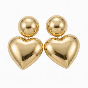 Maite Jewelry                                                Gold Heart & Sphere Earrings - Stylish Statement Accessories for Women