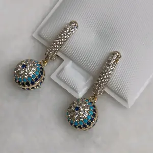 # 0139 Adiamantados Earrings with Blue Eyes and Laminated 14K Gold, High-Quality