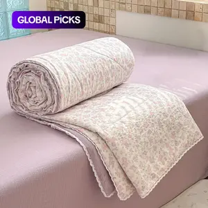 lightweight summer quilt featuring delicate pink-and-purple floral print with lace trim. ultra-soft, skin-friendly quilt, perfect for summer use in bedrooms, offices, on beds, in living rooms, and for relaxing at home Soft Quilts Bedspreads #GLOBAL PICKS