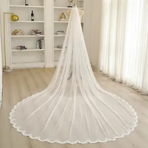 Beaded embellishments, elegant sheer floral lace cathedral-length wedding veil.