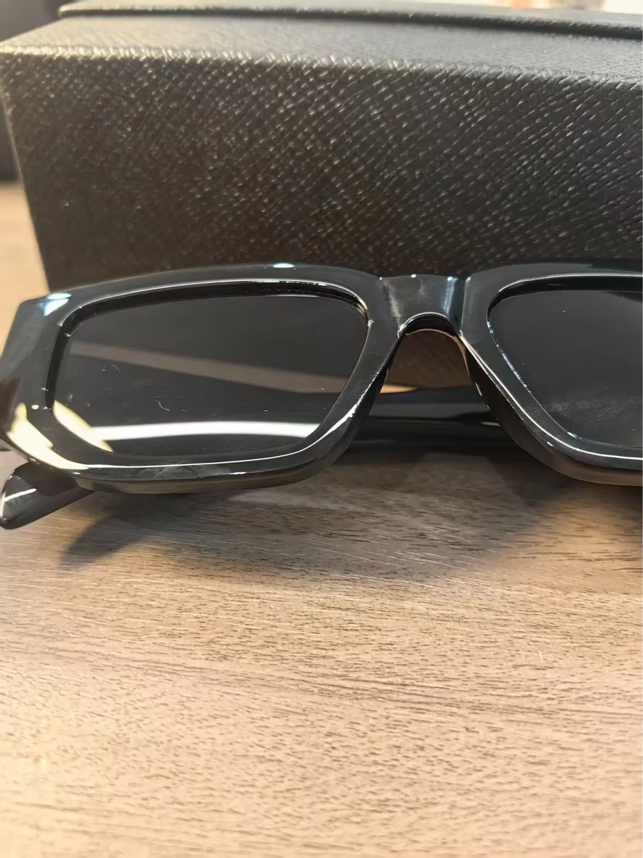 Luxury Black Sunglasses with Unique Design and Stylish Frame